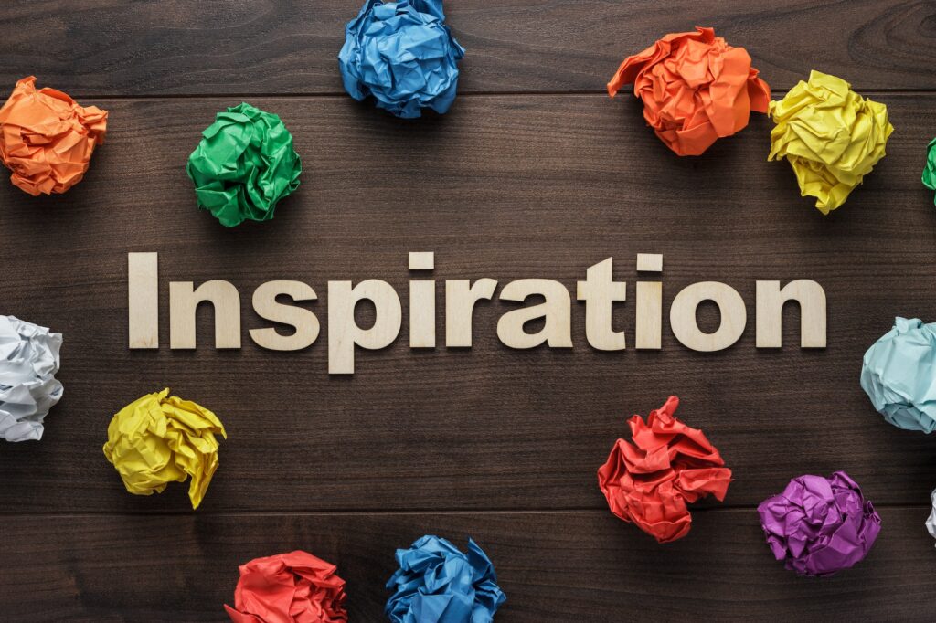 Word Inspiration And Crumpled Colorful Paper