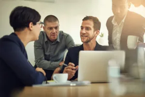 Shot of a group of coworkers having a discussion in a boardroom